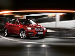 صور سيارات 2009 2009-BMW-X6-Red-Photo4