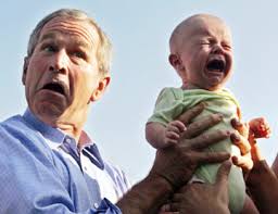 ... rid of twilight or goerge bush. - george-bush-holding-baby