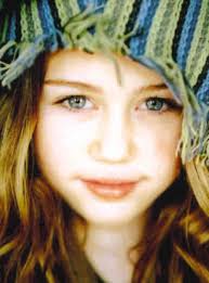 صور لاحلى نجمة MILEY CYRUS والمعروفة باسم HANNAH MONTANA This_Is_Miley_Cyrus--large-msg-1156