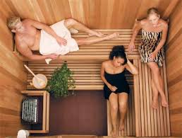 3 people in a sauna