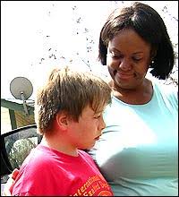 Dr. Regina Benjamin tends to 