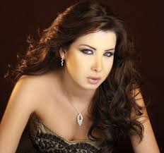 صور نانسي عجرم قبل وبعد عمليه التجميل +ومع زوجها طبيب الاسناان nancy21.jpg