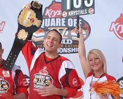 Joey Chestnut claims his prize belt