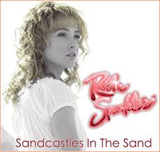 robin sparkles sand castles in the 